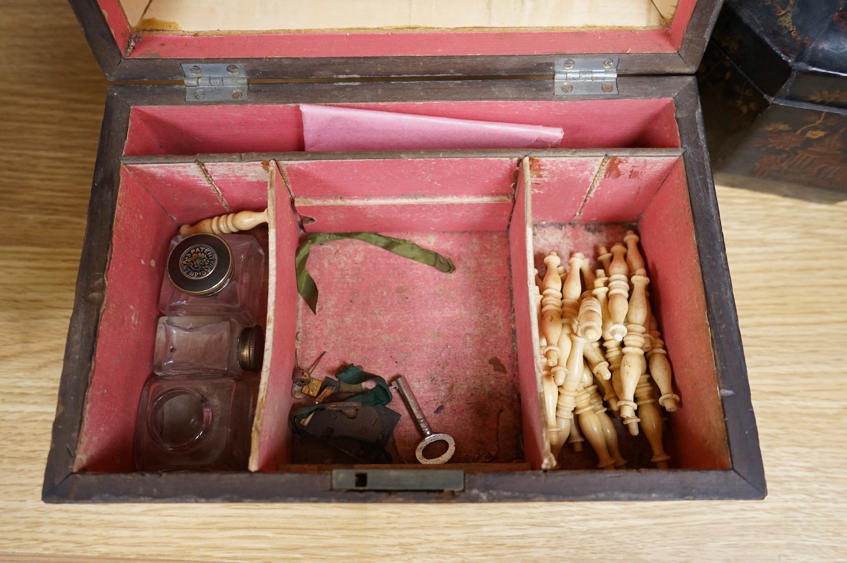 A Chinese lacquer tea caddy and a japanned sewing box (2)